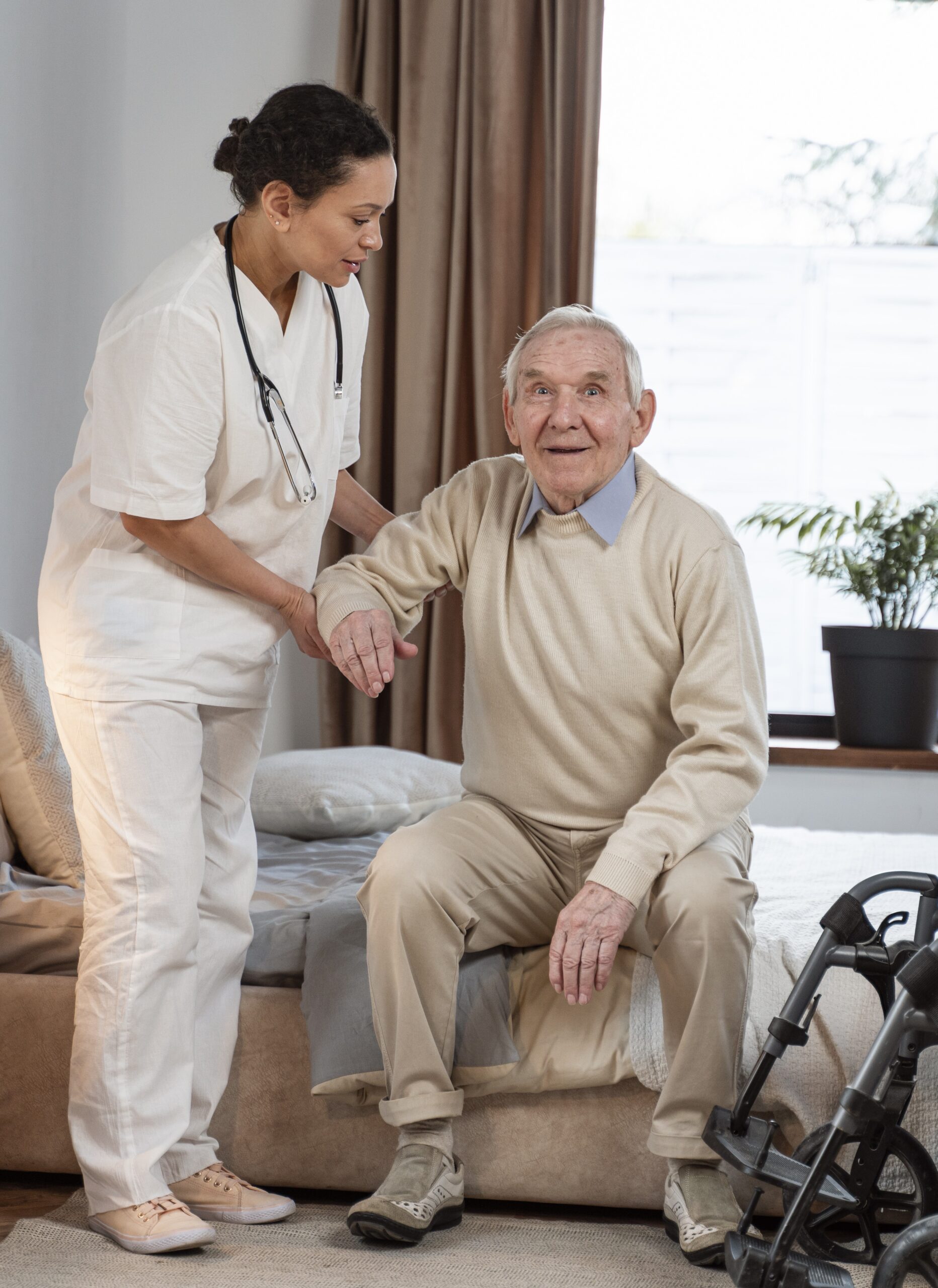 doctor helping senior patient scaled